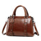 Camille™ | Borsa a spalla lucida