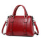 Camille™ | Borsa a spalla lucida