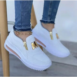 Zoe | Sneakers con Zip Decorative